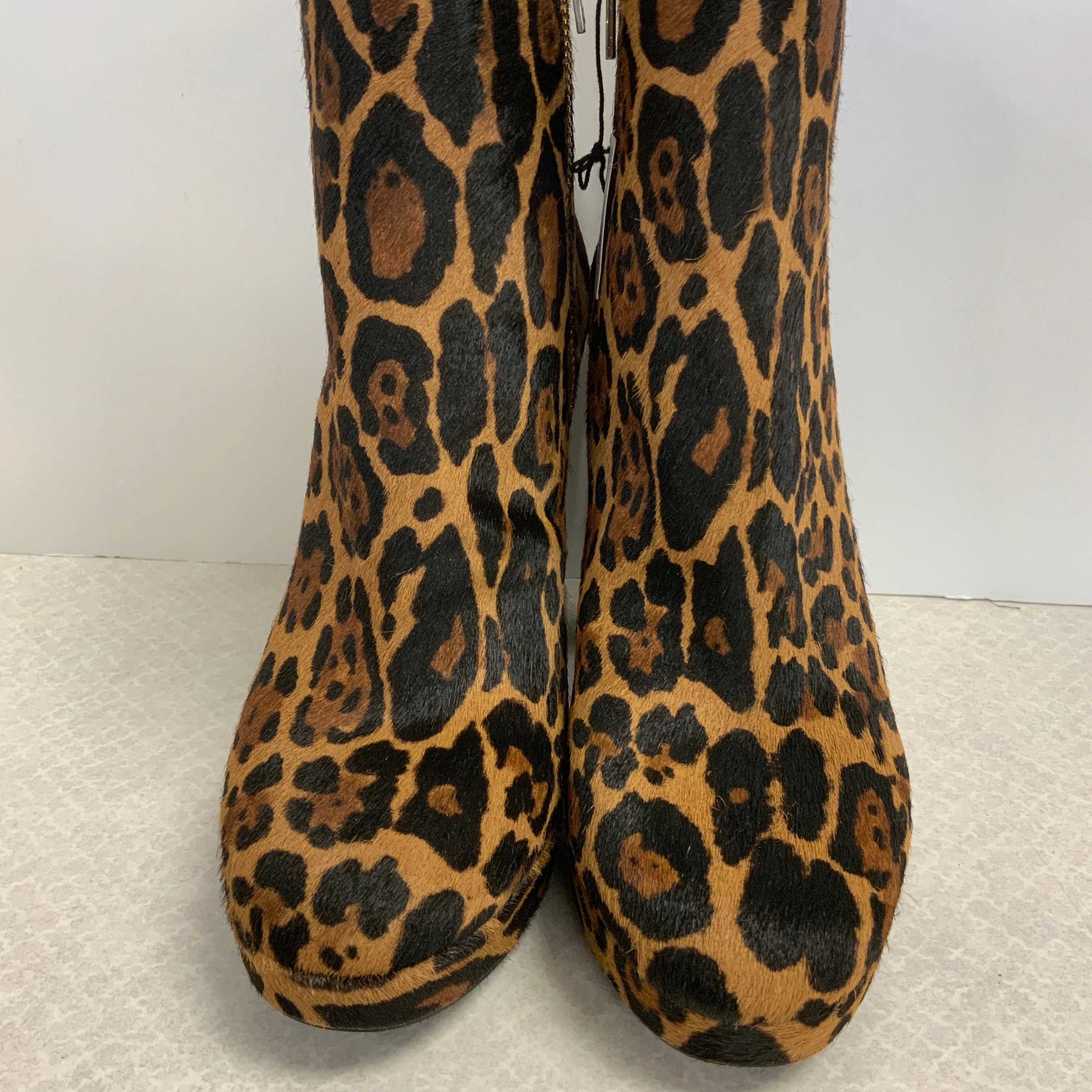 Boots Ankle Heels By Calvin Klein In Animal Print, Size: 7