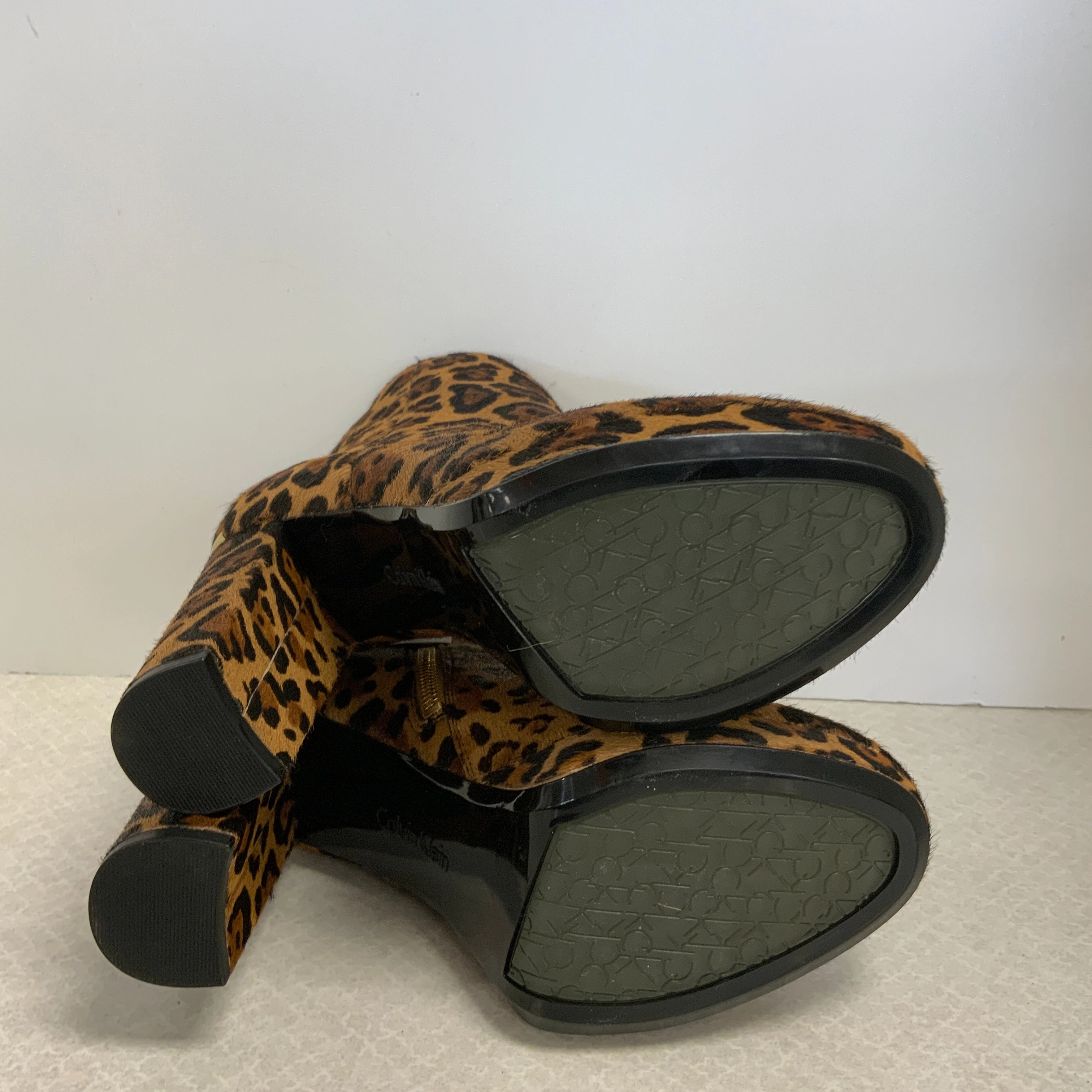 Boots Ankle Heels By Calvin Klein In Animal Print, Size: 7