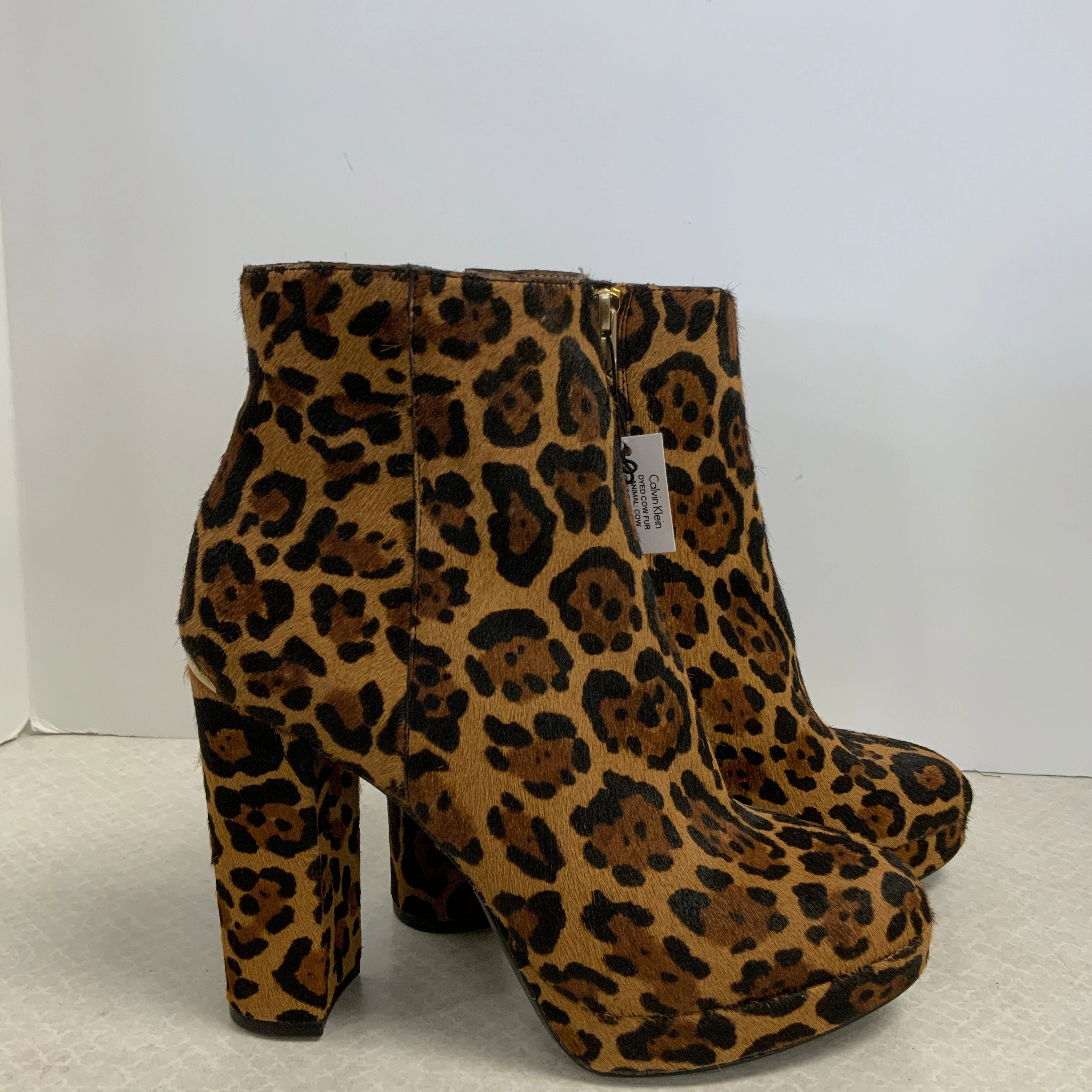 Boots Ankle Heels By Calvin Klein In Animal Print, Size: 7